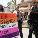 Report Reveals LGBTQ+ People Face Higher Rates of Police Mistreatment — And It’s Affecting When They Call for Help
